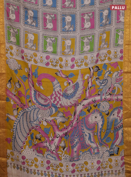 Kalamkari semi silk saree beige mustard yellow and multi colour with allover prints and zari woven border