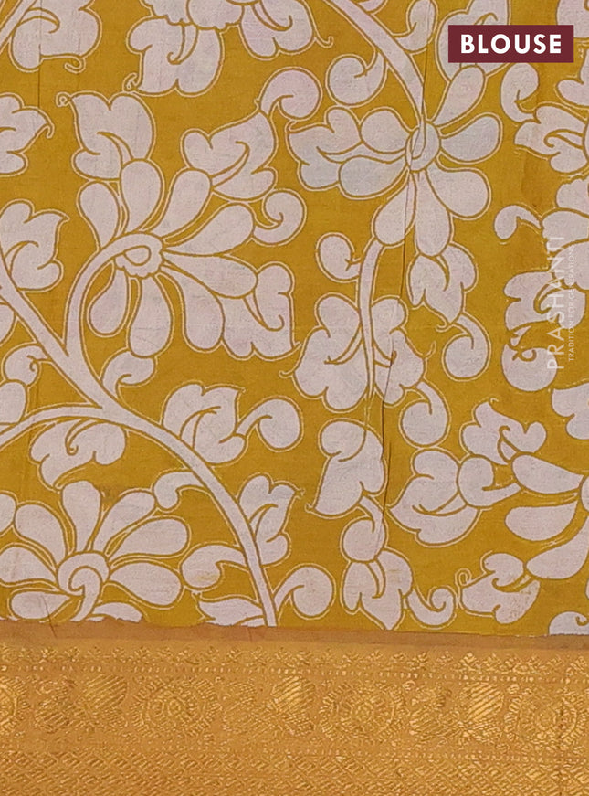 Kalamkari semi silk saree beige mustard yellow and multi colour with allover prints and zari woven border