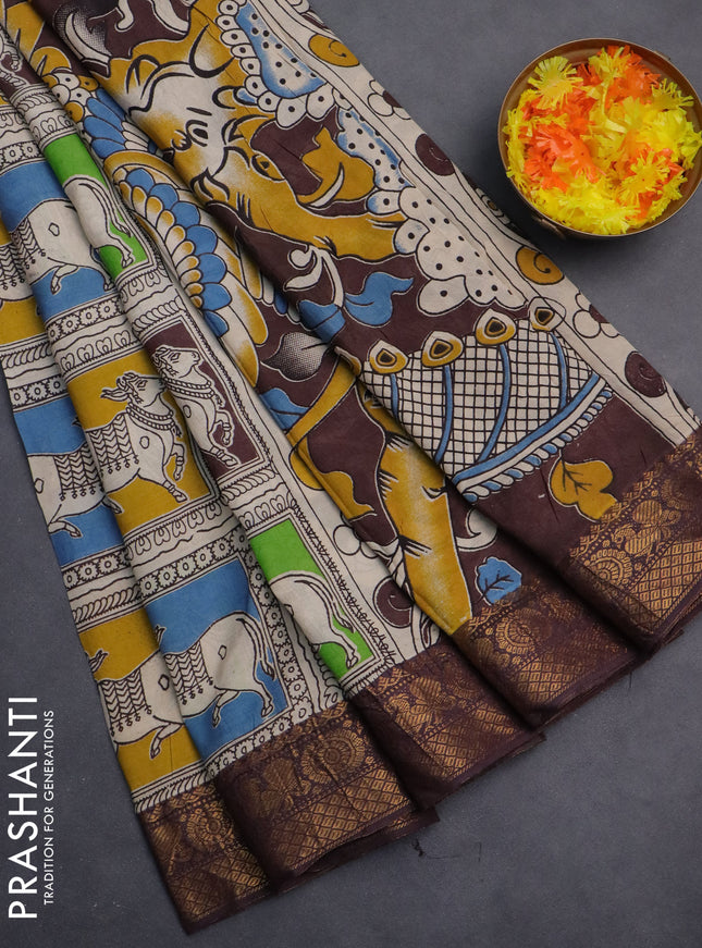 Kalamkari semi silk saree beige brown and multi colour with allover prints and zari woven border