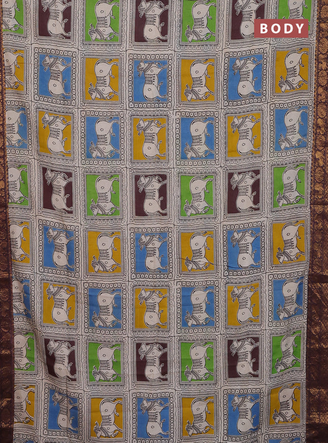 Kalamkari semi silk saree beige brown and multi colour with allover prints and zari woven border