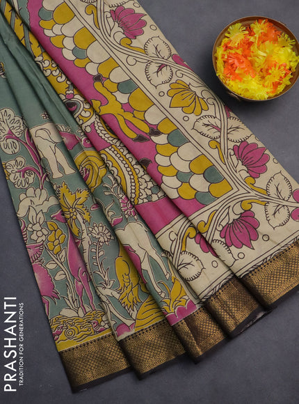 Kalamkari semi silk saree pastel green and black with allover prints and zari woven border