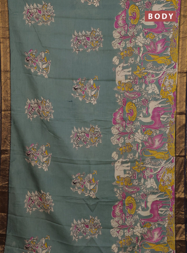 Kalamkari semi silk saree pastel green and black with allover prints and zari woven border