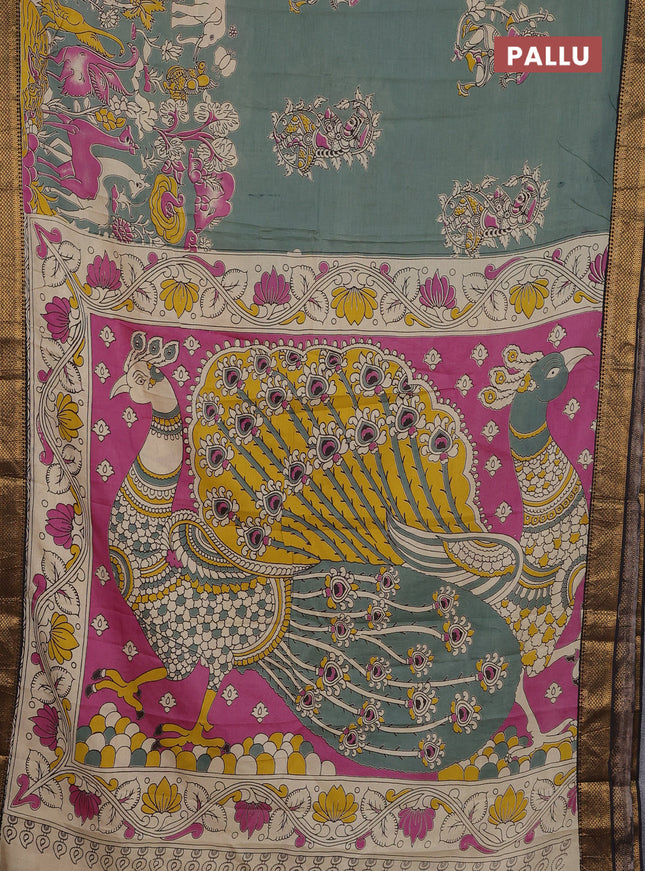 Kalamkari semi silk saree pastel green and black with allover prints and zari woven border