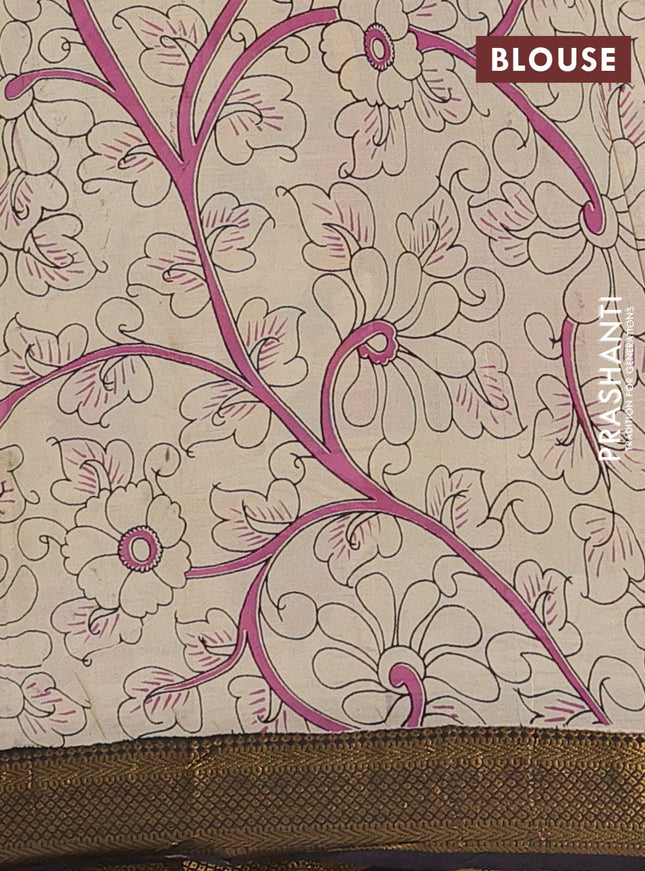 Kalamkari semi silk saree pastel green and black with allover prints and zari woven border