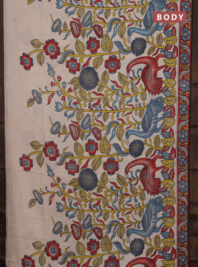Kalamkari semi silk saree beige and black with allover prints and zari woven border