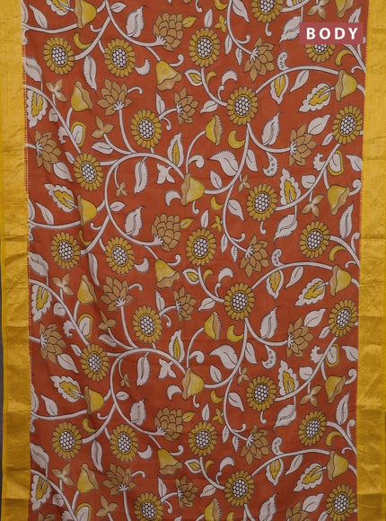 Kalamkari semi silk saree rust shade and yellow with allover prints and zari woven border