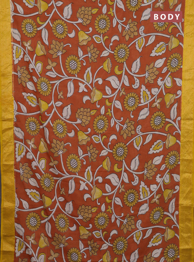 Kalamkari semi silk saree rust shade and yellow with allover prints and zari woven border