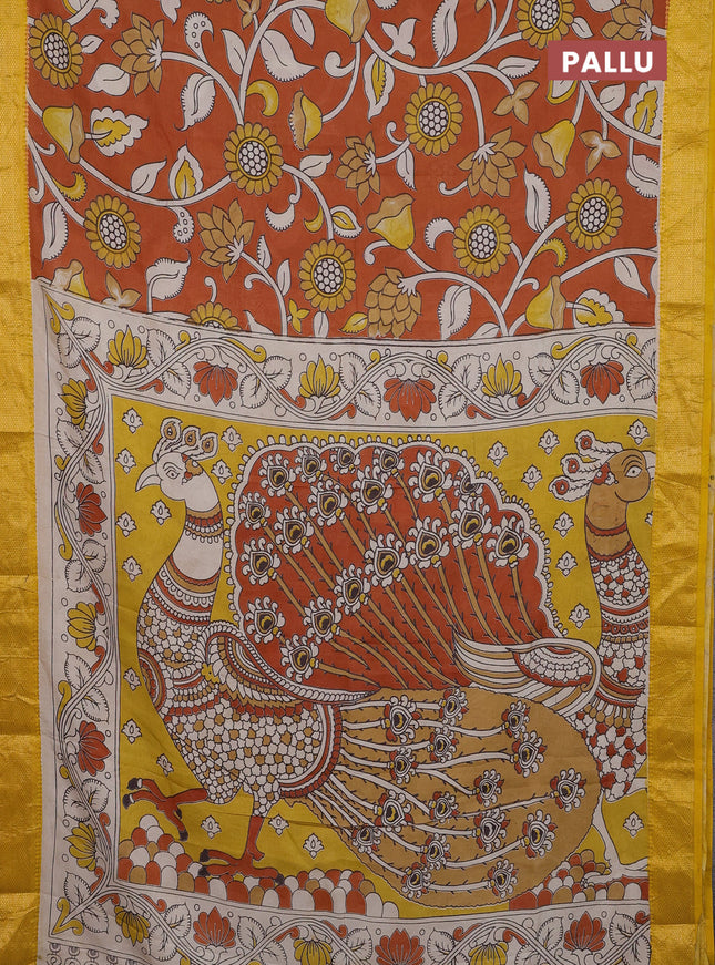 Kalamkari semi silk saree rust shade and yellow with allover prints and zari woven border