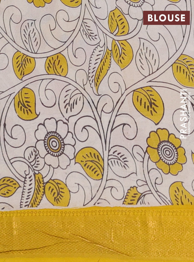 Kalamkari semi silk saree rust shade and yellow with allover prints and zari woven border
