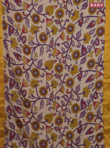 Kalamkari semi silk saree beige and yellow with allover prints and zari woven border