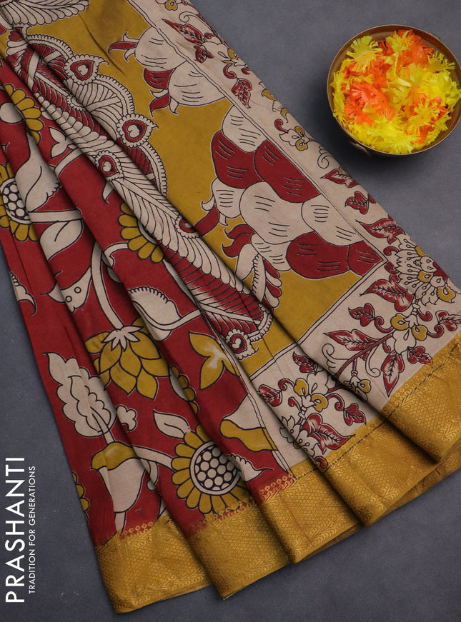 Kalamkari semi silk saree maroon and mustard shade with allover prints and zari woven border