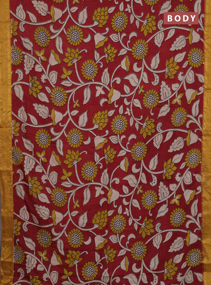 Kalamkari semi silk saree maroon and mustard shade with allover prints and zari woven border