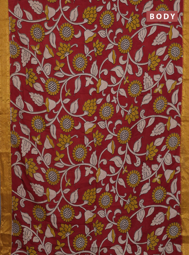 Kalamkari semi silk saree maroon and mustard shade with allover prints and zari woven border