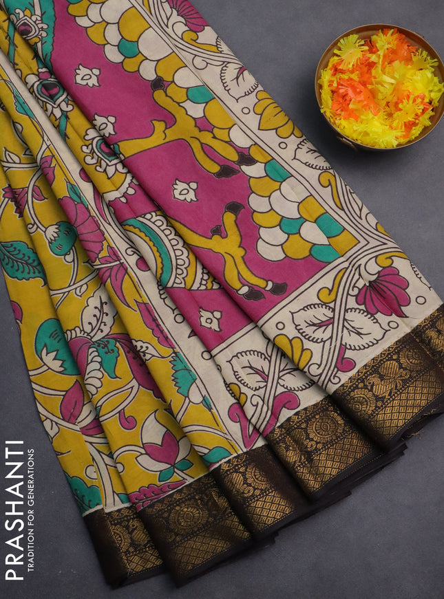 Kalamkari semi silk saree yellow and black with allover prints and zari woven border