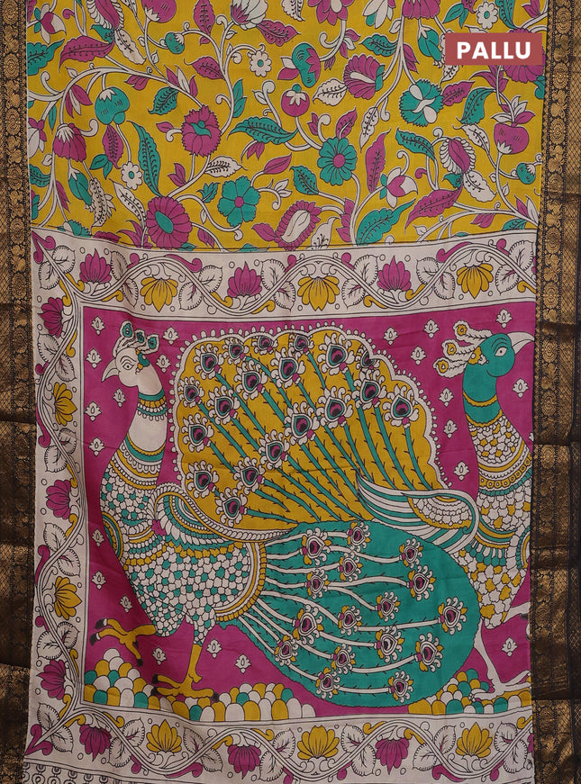Kalamkari semi silk saree yellow and black with allover prints and zari woven border