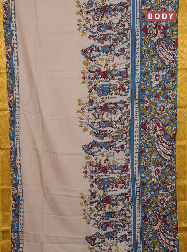 Kalamkari semi silk saree teal blue and yellow with allover prints and zari woven border
