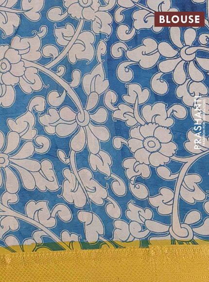 Kalamkari semi silk saree teal blue and yellow with allover prints and zari woven border