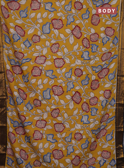Kalamkari semi silk saree mustard yellow and black with allover prints and zari woven border