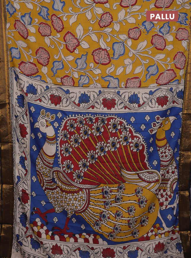 Kalamkari semi silk saree mustard yellow and black with allover prints and zari woven border