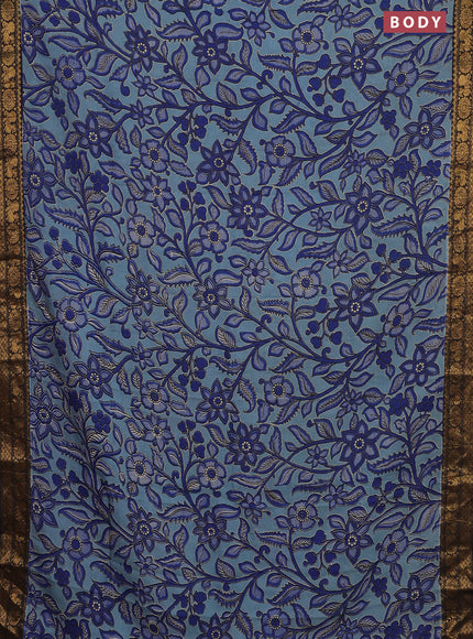 Kalamkari semi silk saree pastel blue and black with allover prints and zari woven border
