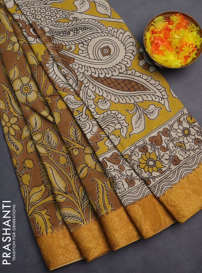 Kalamkari semi silk saree dark mustard and mustard yellow with allover prints and zari woven border