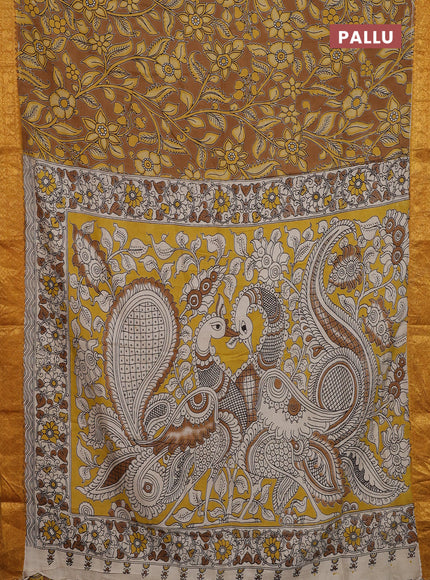 Kalamkari semi silk saree dark mustard and mustard yellow with allover prints and zari woven border