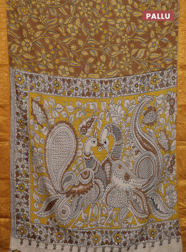 Kalamkari semi silk saree dark mustard and mustard yellow with allover prints and zari woven border