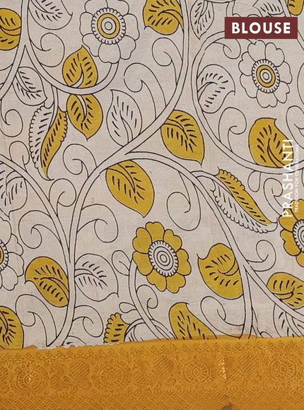 Kalamkari semi silk saree dark mustard and mustard yellow with allover prints and zari woven border