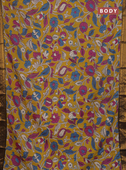 Kalamkari semi silk saree mustard yellow and black with allover prints and zari woven border