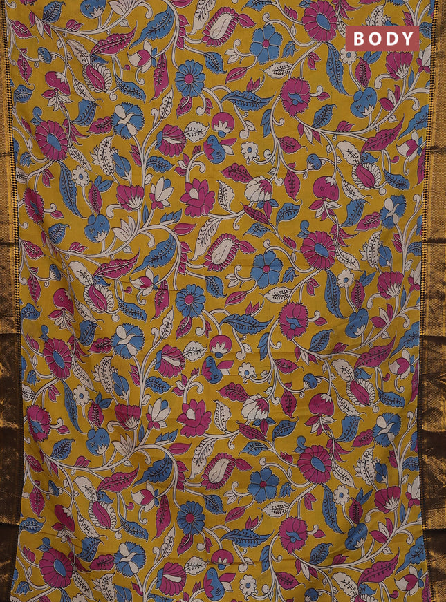 Kalamkari semi silk saree mustard yellow and black with allover prints and zari woven border