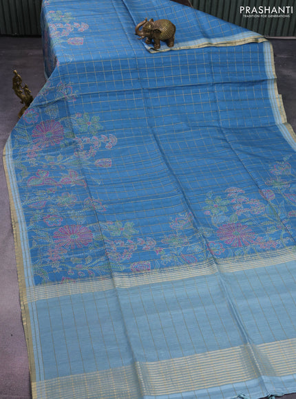 Semi tussar saree blue and pastel blue with allover zari checks & digital prints and zari woven border