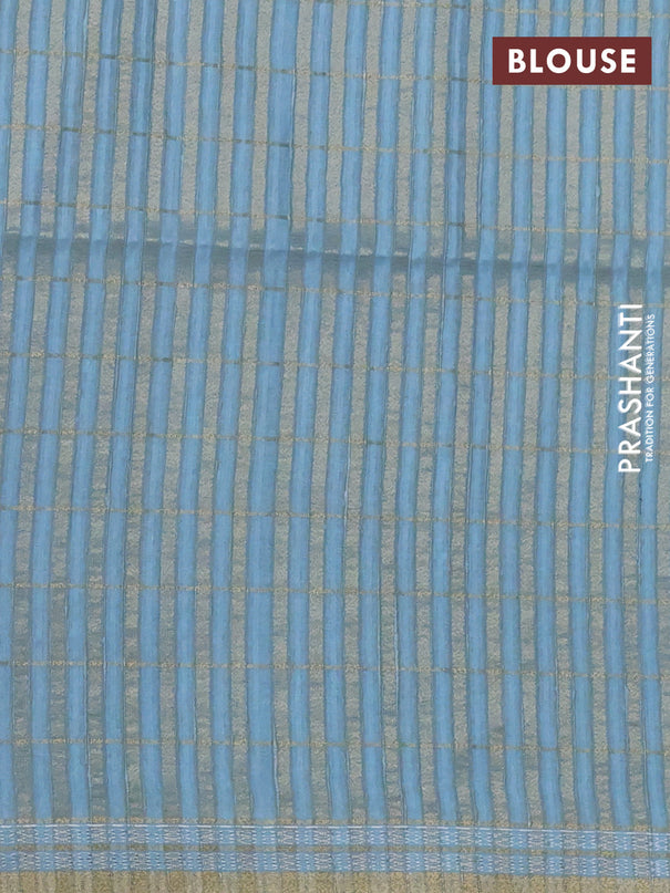 Semi tussar saree blue and pastel blue with allover zari checks & digital prints and zari woven border