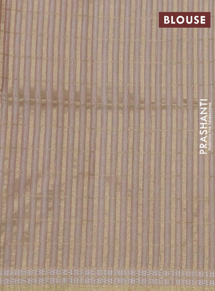 Semi tussar saree sandal and beige with allover zari checks & digital prints and zari woven border