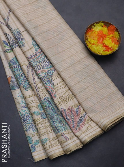 Semi tussar saree cream with allover zari checks & digital prints and zari woven border