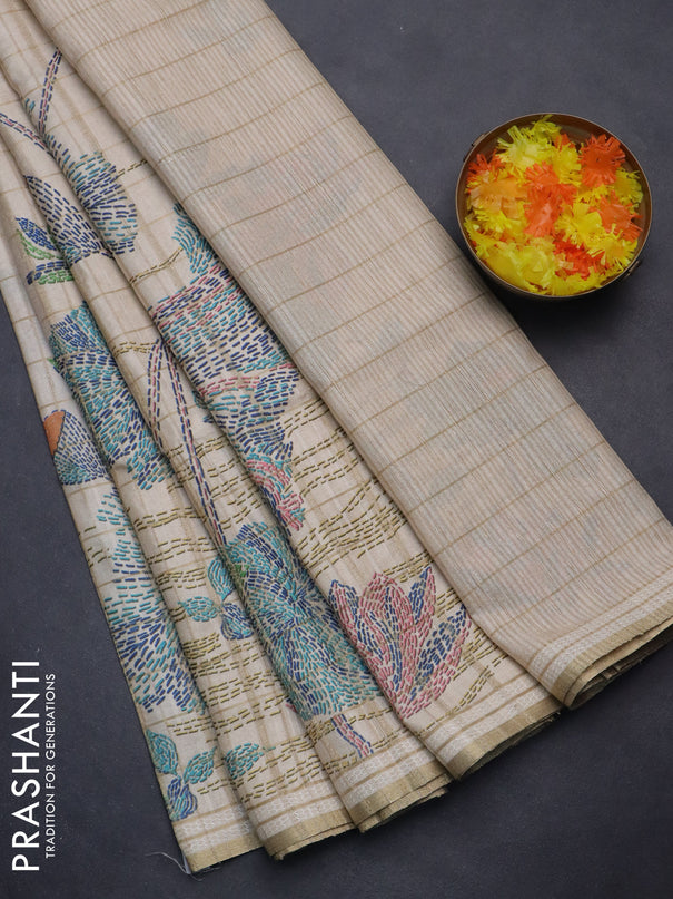 Semi tussar saree cream with allover zari checks & digital prints and zari woven border