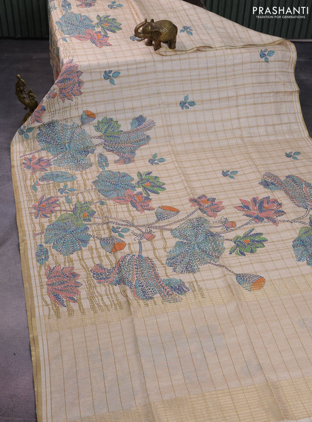 Semi tussar saree cream with allover zari checks & digital prints and zari woven border