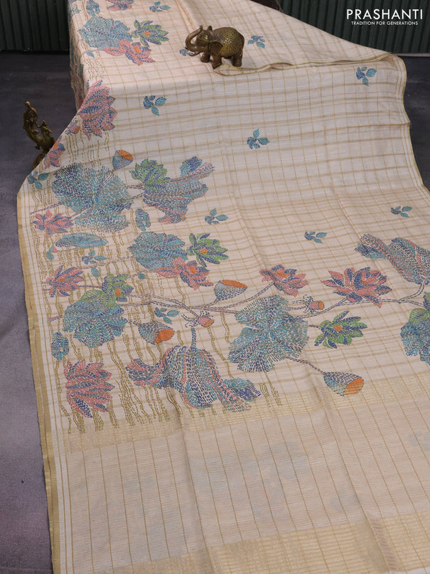 Semi tussar saree cream with allover zari checks & digital prints and zari woven border