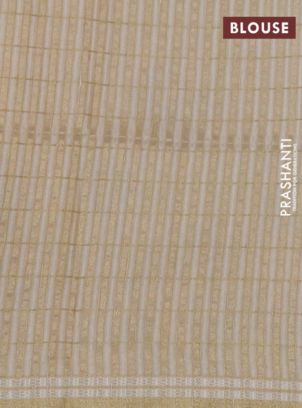 Semi tussar saree sandal with allover zari checks & digital prints and zari woven border