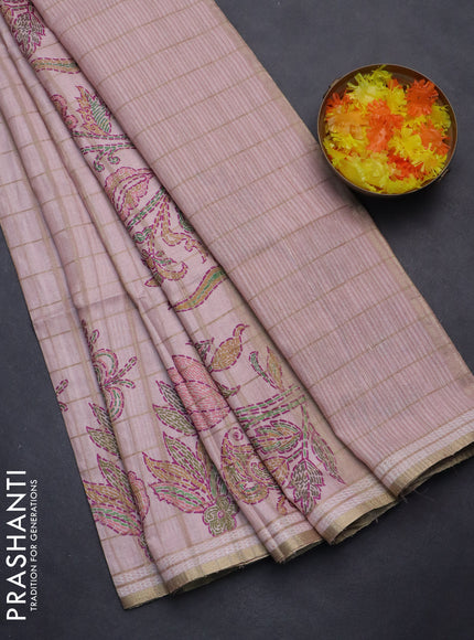 Semi tussar saree peach shade with allover zari checks & digital prints and zari woven border