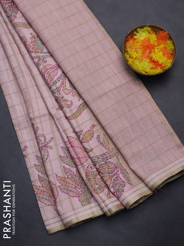 Semi tussar saree peach shade with allover zari checks & digital prints and zari woven border