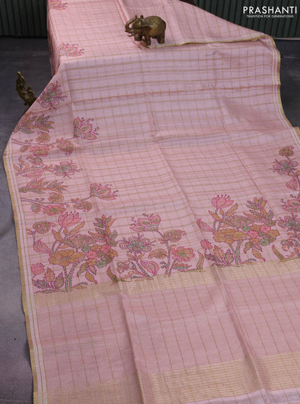 Semi tussar saree peach shade with allover zari checks & digital prints and zari woven border