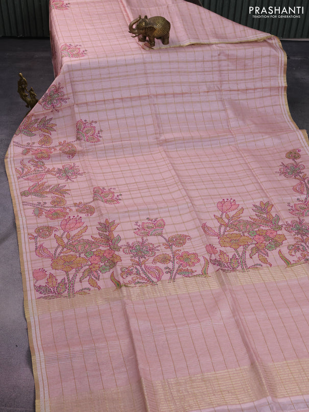 Semi tussar saree peach shade with allover zari checks & digital prints and zari woven border