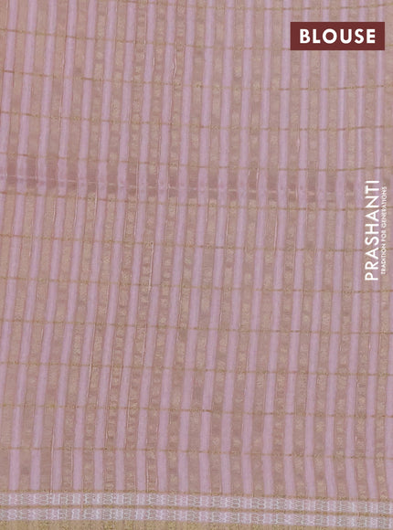 Semi tussar saree peach shade with allover zari checks & digital prints and zari woven border