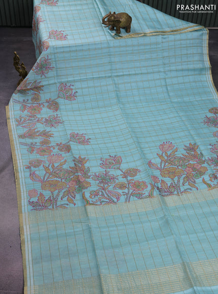 Semi tussar saree teal blue with allover zari checks & digital prints and zari woven border