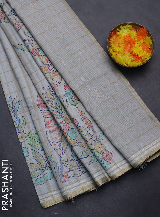 Semi tussar saree pastel grey with allover zari checks & digital prints and zari woven border