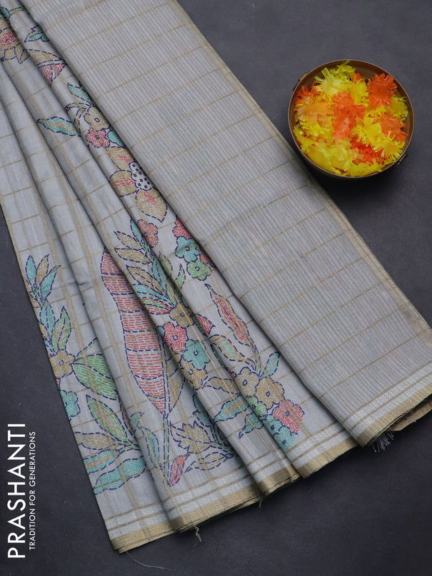 Semi tussar saree pastel grey with allover zari checks & digital prints and zari woven border