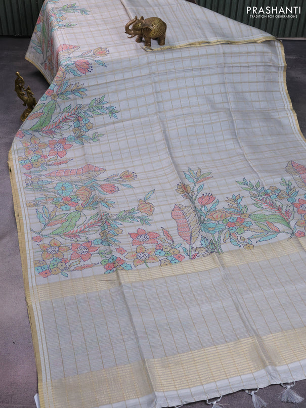 Semi tussar saree pastel grey with allover zari checks & digital prints and zari woven border