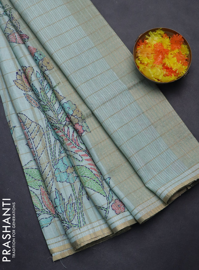 Semi tussar saree pastel green with allover zari checks & digital prints and zari woven border