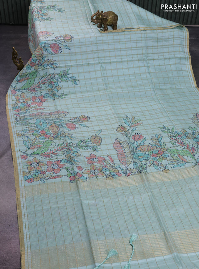 Semi tussar saree pastel green with allover zari checks & digital prints and zari woven border