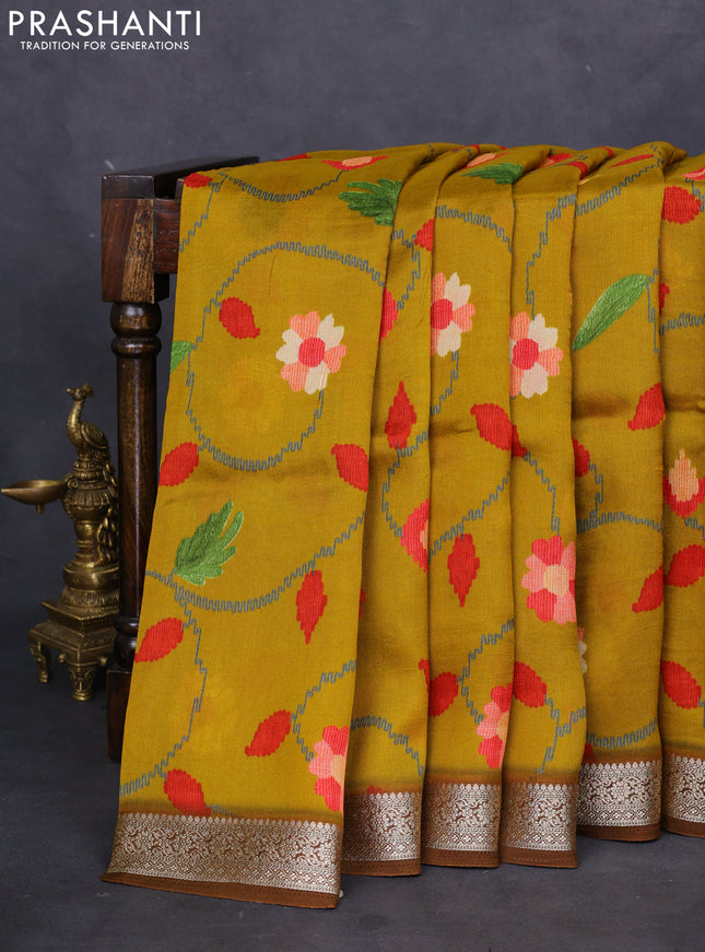 Tussar georgette silk saree mustard yellow and brown with allover digital prints and zari woven border